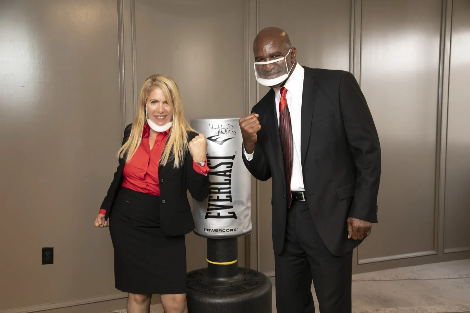 Penny Foskaris with champion athlete Evander Holyfield