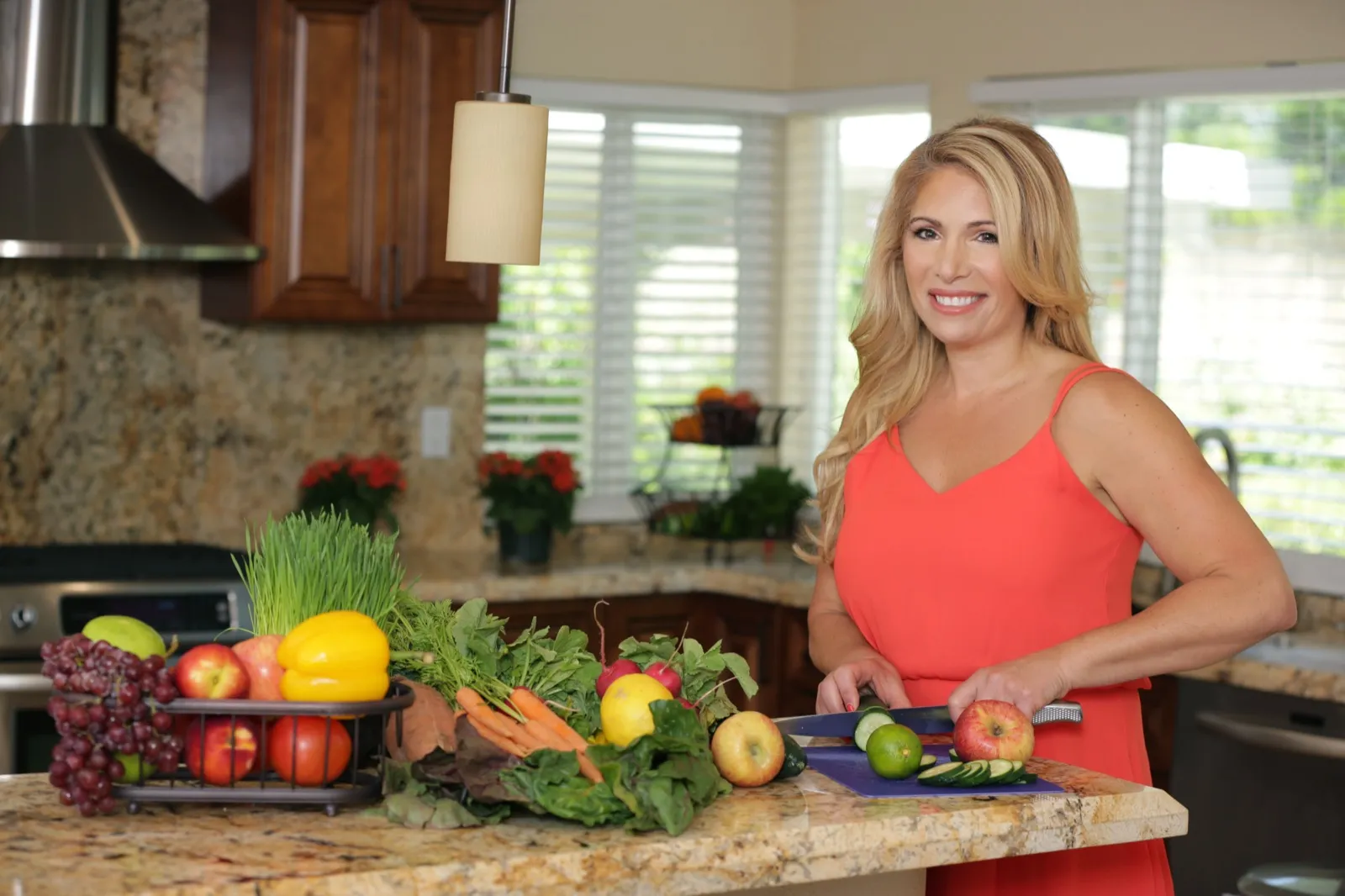 Penny Foskaris preparing fresh whole foods for a cooking demonstration